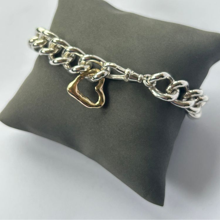Vintage silver bangle with integrated Lulu and Boo molten 9ct gold heart
