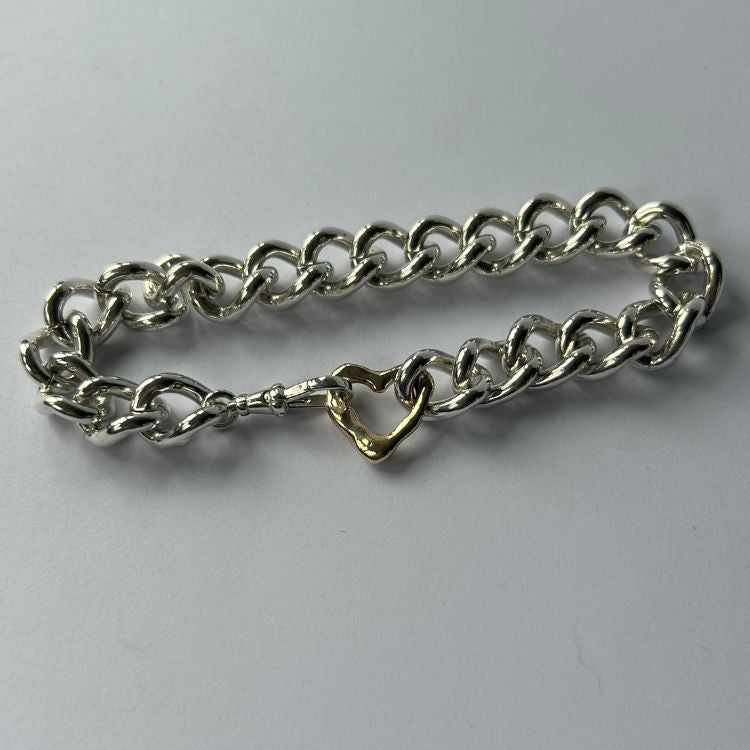 Vintage heavy silver bangle with integrated Lulu and Boo molten 9ct gold heart