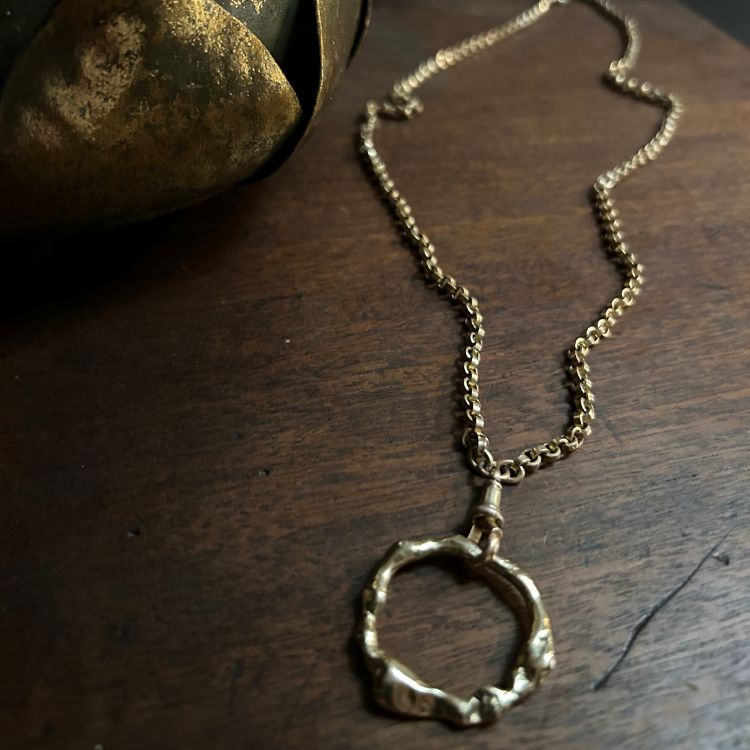 Stunning large 9ct gold halo with antique 9ct gold guard chain.