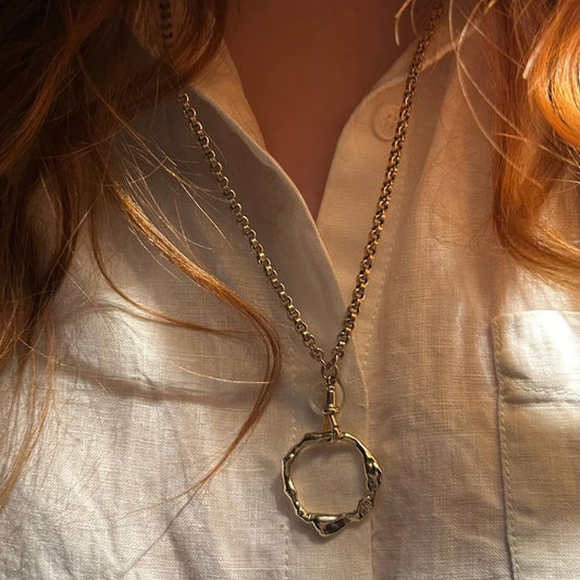 Stunning large 9ct gold halo with antique 9ct gold guard chain.