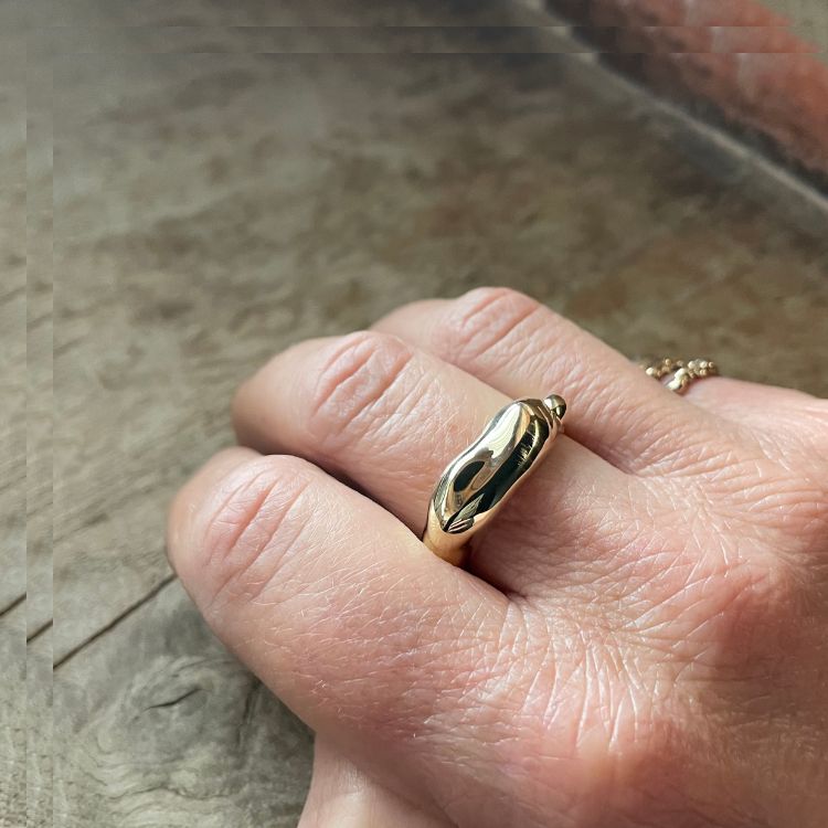An 18ct gold wedding band from Lulu and Boo Jewellery.