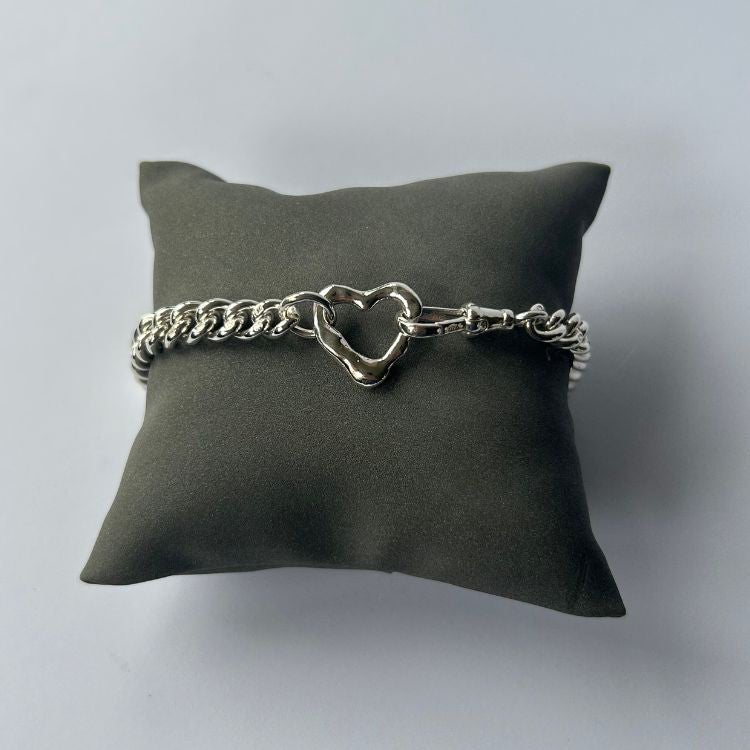 Silver vintage bangle with Lulu and Boo silver molten heart charm.