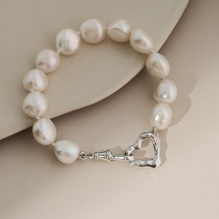 Pearl bracelet with silver molten heart