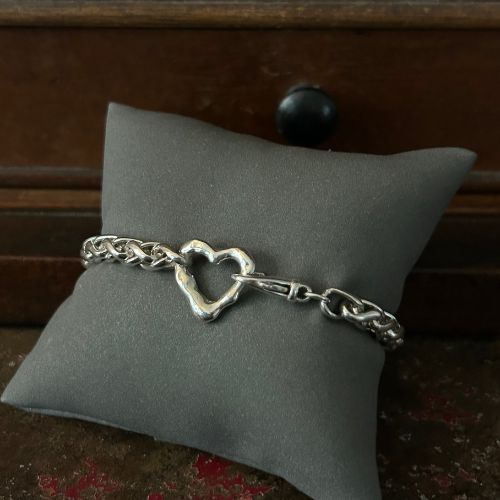 Vintage woven silver chain bracelet with integrated Lulu and Boo molten heart