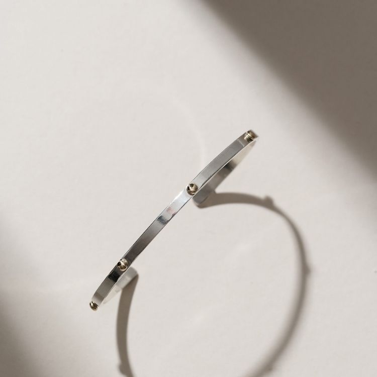 Marianne Silver and 9ct Gold Cuff Bracelet from Lulu and Boo Jewellery.