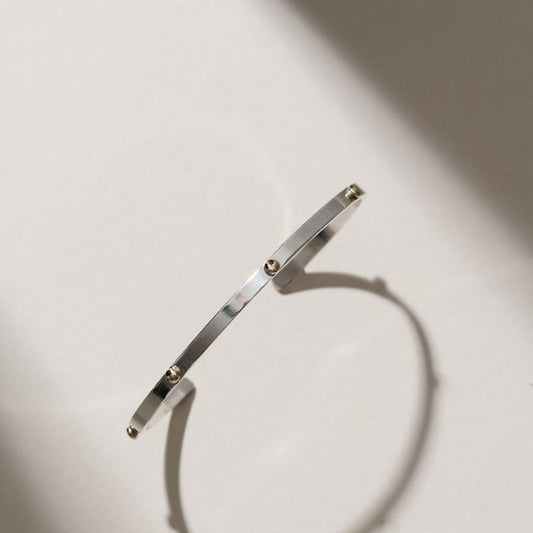 Marianne Silver and 9ct Gold Cuff Bracelet from Lulu and Boo Jewellery.