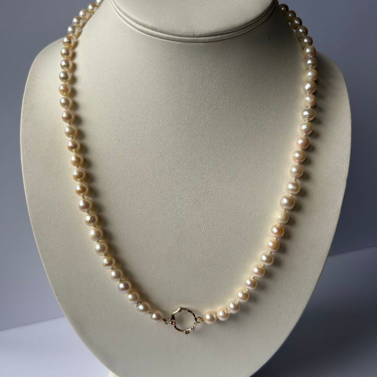 Stunning vintage pearl necklace with integrated Lulu and Boo 9ct gold small halo