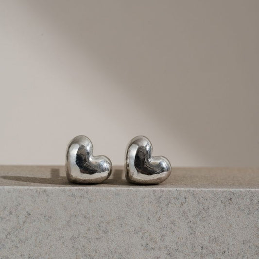 A pair of Sterling Silver Heart Stud Earrings from Lulu and Boo