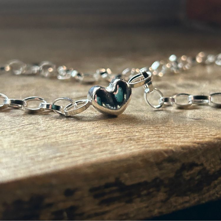 A Puffy Heart Silver Choker from Lulu and Boo Jewellery.