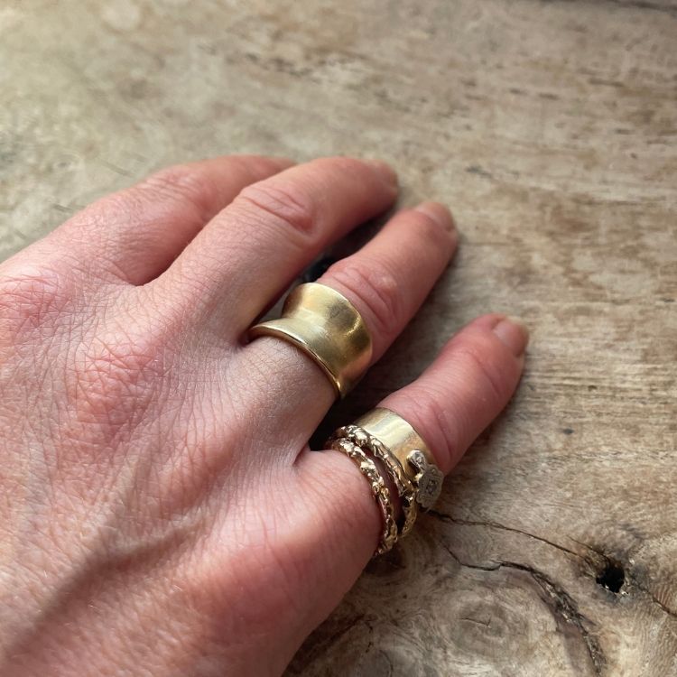 A Brushed 9ct Gold Saddle Ring from Lulu and Boo Jewellery.
