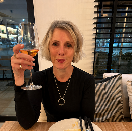 Corinne wearing a Large Halo necklace
