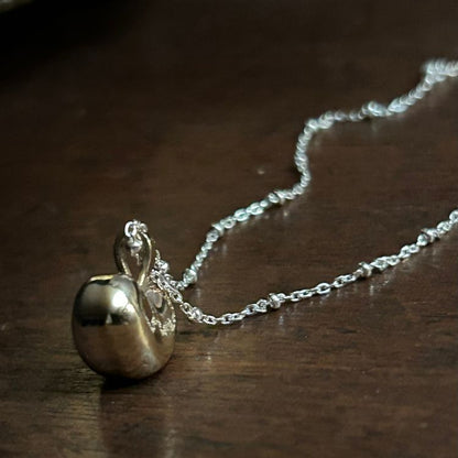 A Puffy Heart Mixed Metals Necklace from Lulu and Boo Jewellery.