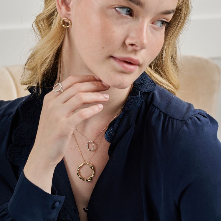 A small Sterling Silver Halo Pendant from Lulu and Boo Jewellery.
