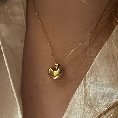 9ct gold hand crafted Puffy heart pendant and 9ct satellite chain.