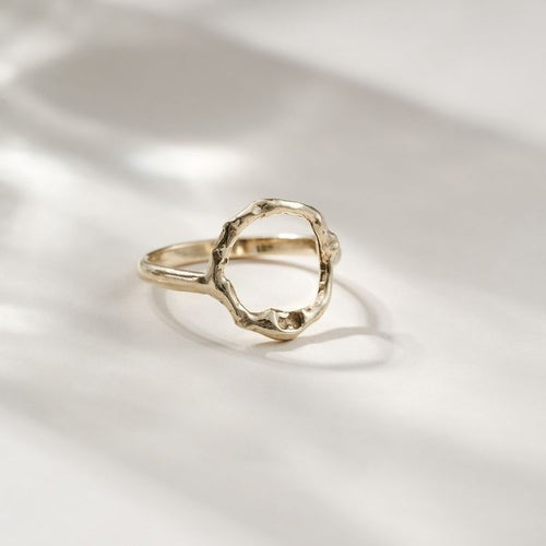 A Gold Halo Ring from Lulu and Boo Jewellery.
