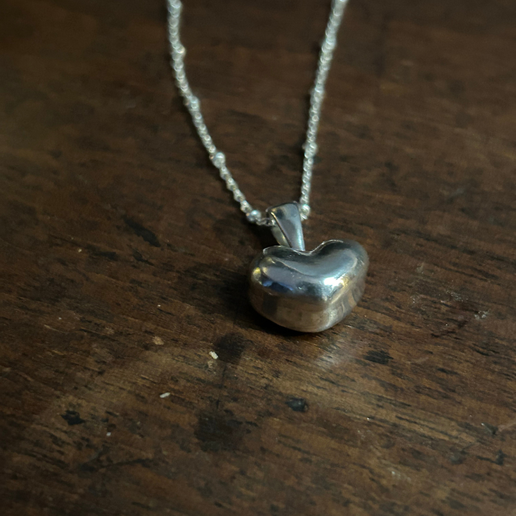 Sterling silver hand crafted Puffy heart pendant and satellite chain.
