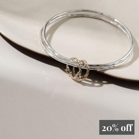 Sterling Silver Charm Bangle with Two 9ct Gold Halo Charms