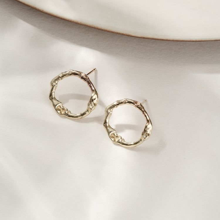 A pair of 18ct Gold Stud Earrings from Lulu and Boo Jewellery.
