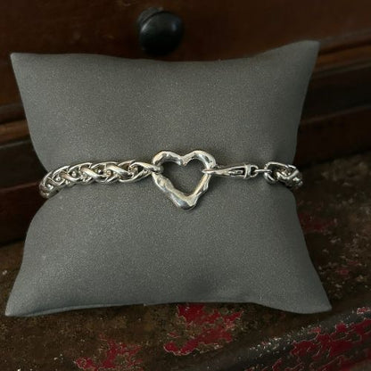 Vintage woven silver chain bracelet with integrated Lulu and Boo molten heart