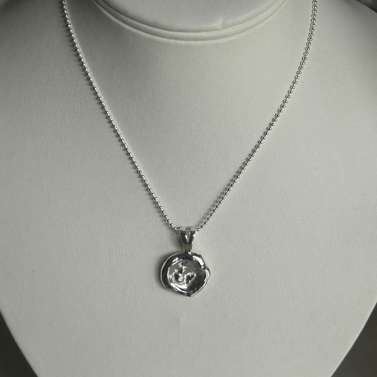 Water cast silver necklace