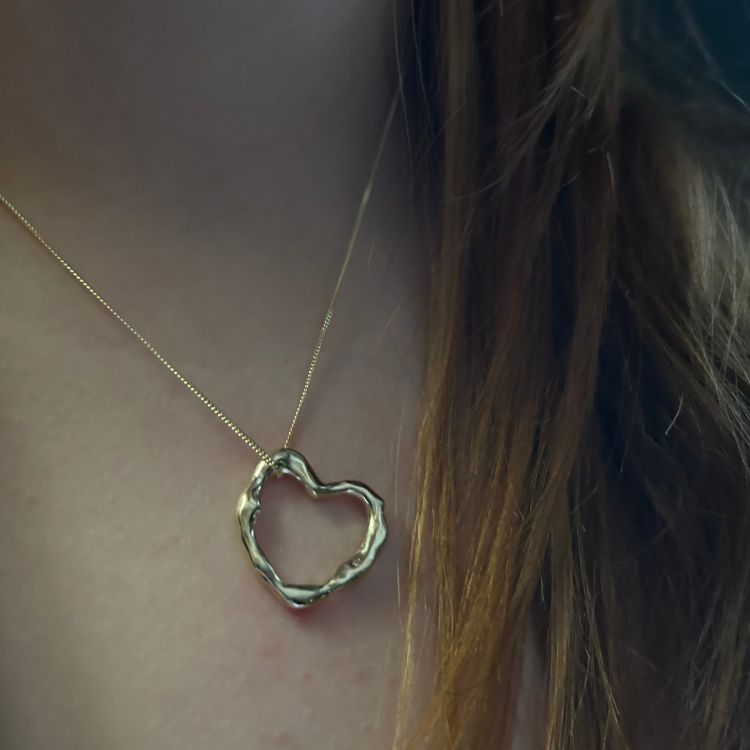 A Large Molten Heart 9ct Gold Necklace from Lulu and Boo Jewellery.