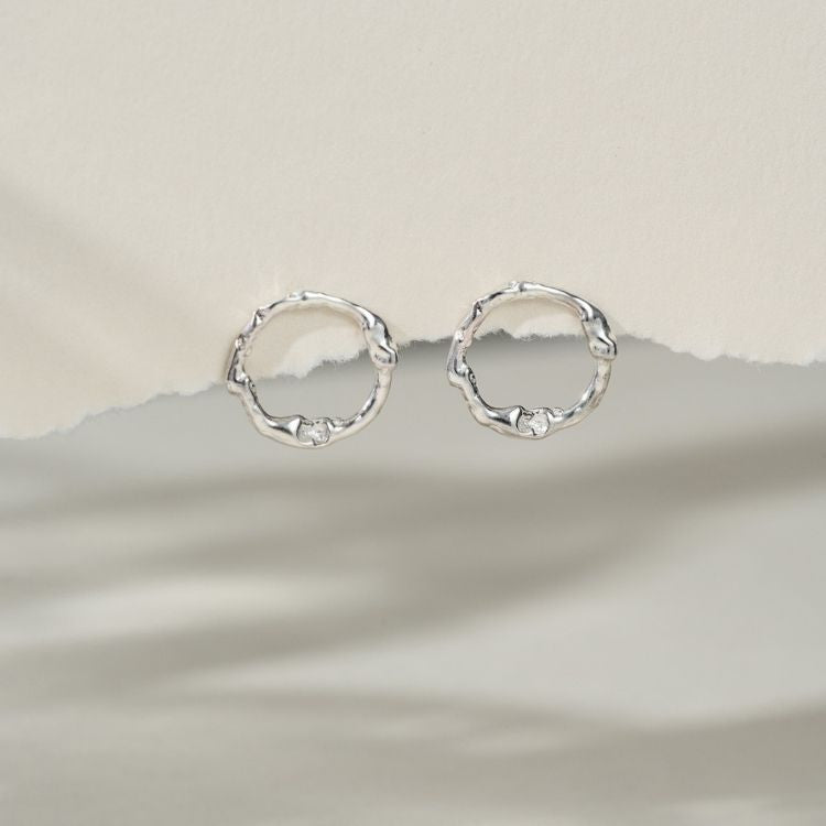 A pair of Silver Halo Stud Earrings from Lulu and Boo Jewellery.