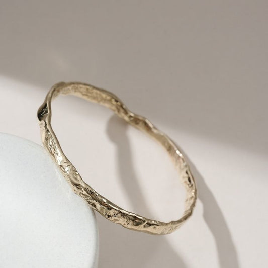 Reticulated molten 9ct gold bangle