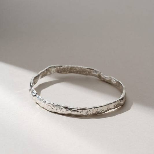Reticulated molten sterling silver bangle