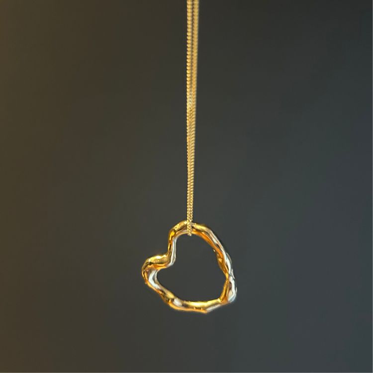 A Large Molten 9ct Gold Heart  Necklace from Lulu and Boo Jewellery.