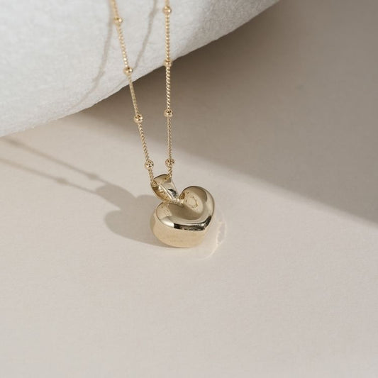 9ct gold hand crafted Puffy heart pendant and 9ct satellite chain.