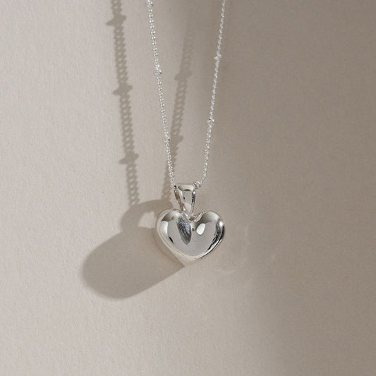 Sterling silver hand crafted Puffy heart pendant and satellite chain.