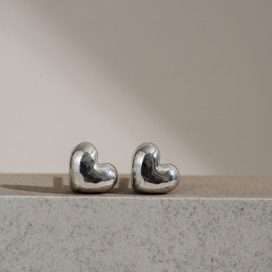 Sterling silver puffy heart chunky stud earrings.