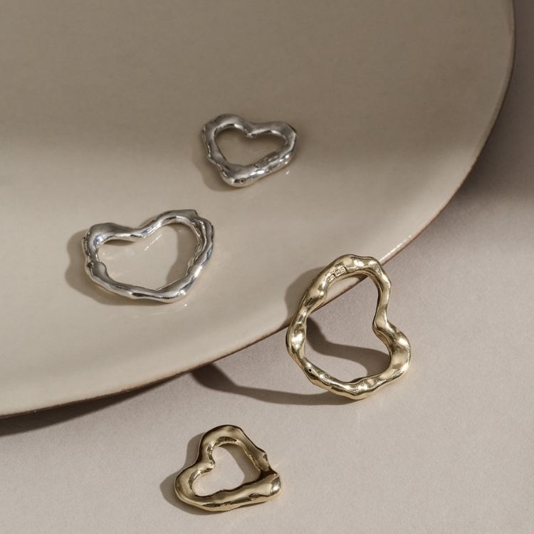 A Molten Sterling Silver Small Heart Necklace from Lulu and Boo Jewellery.