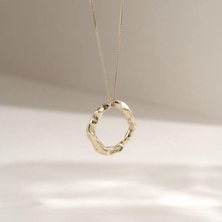 A Gold Halo Pendant  from Lulu and Boo Jewellery.
