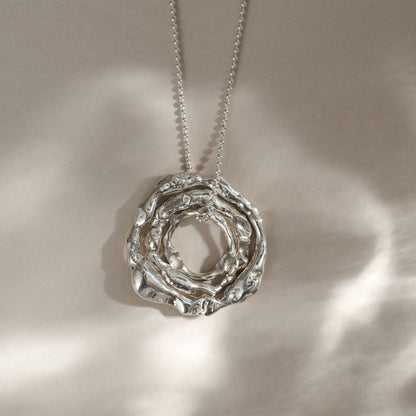 A Large Molten Sterling Silver Halo Necklace from Lulu and Boo Jewellery.