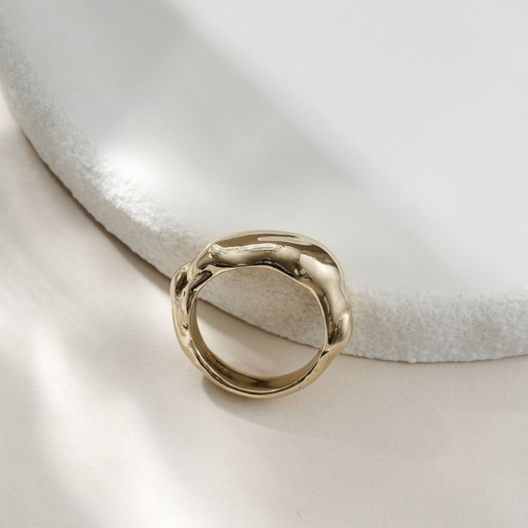 A Molten 9ct Gold Chunky Ring from Lulu and Boo Jewellery.
