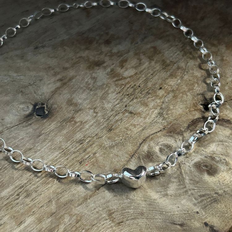 Silver puffy heart choker