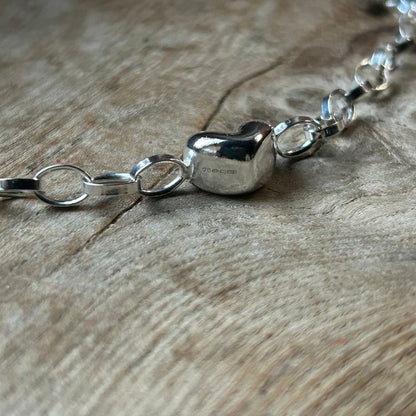 Silver puffy heart choker