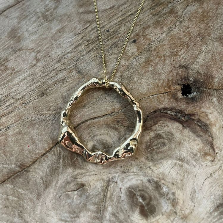 A Gold halo Pendant - Large halo from Lulu and Boo Jewellery.
