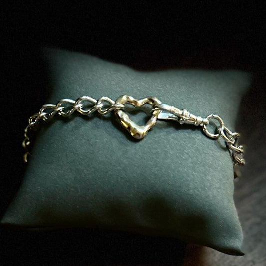 Vintage silver bangle with integrated Lulu and Boo molten 9ct gold heart