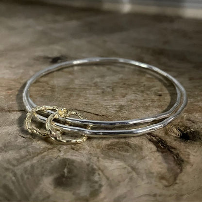 Molten hoops bangle with duo of gold halo charms