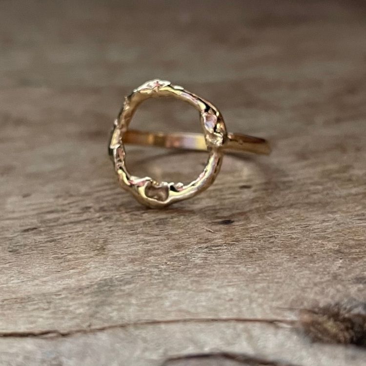 A Gold Halo Ring from Lulu and Boo Jewellery.